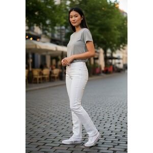 Tory Burch white Super Skinny denim embroidered pocket jeans, size 29.